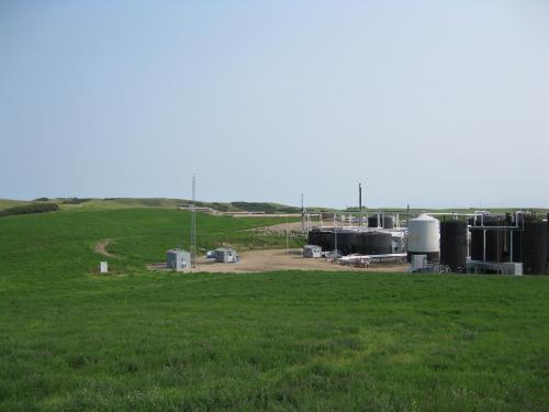 View of custody transfer pump, sales tanks at the north end of the plant